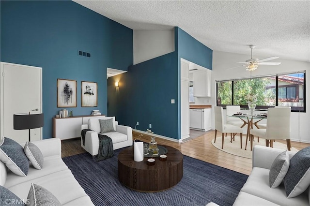 18165 Sundowner Way Unit 914, Canyon Country, CA 91387 - living area featuring a textured ceiling, light wood-style flooring, high vaulted ceiling, and ceiling fan