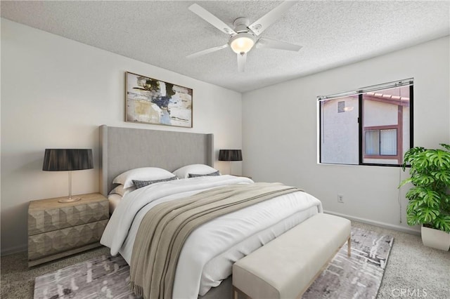 18165 Sundowner Way Unit 914, Canyon Country, CA 91387 - carpeted bedroom featuring a textured ceiling and a ceiling fan
