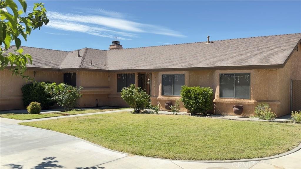 19077 Goleta St, Hesperia, CA 92345 - single story home featuring roof with shingles, a front yard, and a chimney