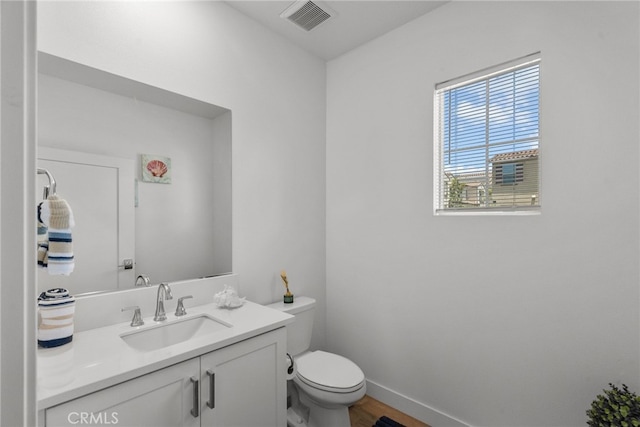 12062 Turnleaf Ave, Whittier, CA 90602 - half bath featuring vanity and wood finished floors
