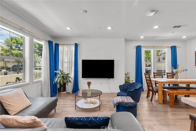 12062 Turnleaf Ave, Whittier, CA 90602 - living room featuring plenty of natural light, wood finished floors, and recessed lighting