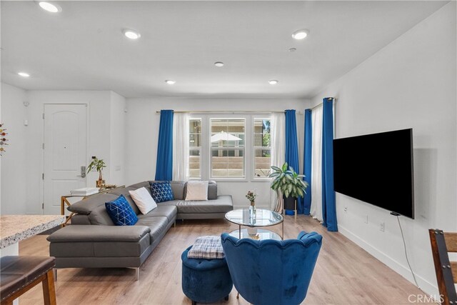12062 Turnleaf Ave, Whittier, CA 90602 - living room with light wood finished floors and recessed lighting