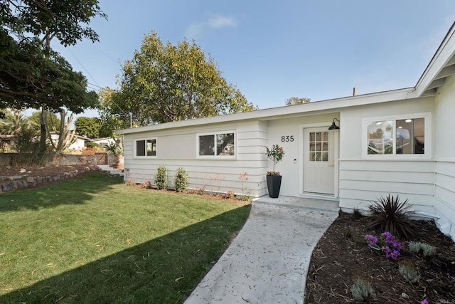 835 Cathy Ln, Cardiff By The Sea, CA 92007 - view of exterior entry featuring a lawn
