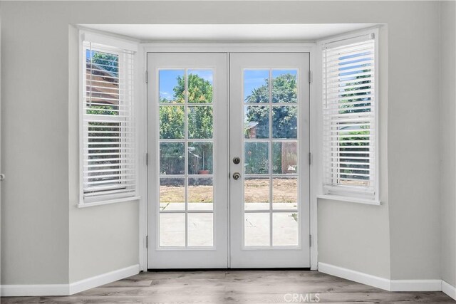6017 Brockton Ave, Riverside, CA 92506 - entryway featuring french doors and wood finished floors