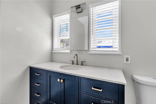 6017 Brockton Ave, Riverside, CA 92506 - bathroom featuring toilet and vanity