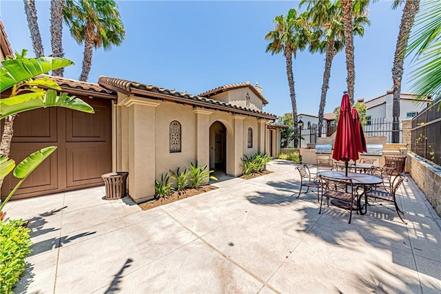 18956 Northern Dancer Ln, Yorba Linda, CA 92886 - view of patio / terrace with outdoor dining area and exterior kitchen