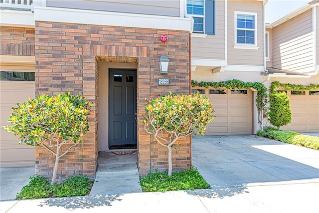 18956 Northern Dancer Ln, Yorba Linda, CA 92886 - entrance to property featuring driveway, a garage, and brick siding