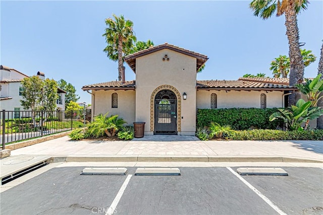 18956 Northern Dancer Ln, Yorba Linda, CA 92886 - mediterranean / spanish home featuring a tiled roof, uncovered parking, and stucco siding