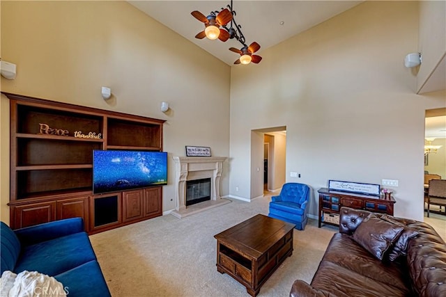 18956 Northern Dancer Ln, Yorba Linda, CA 92886 - living room featuring high vaulted ceiling, carpet floors, a glass covered fireplace, and ceiling fan