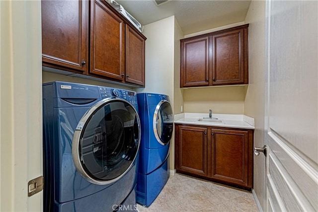 18956 Northern Dancer Ln, Yorba Linda, CA 92886 - laundry area with cabinet space, independent washer and dryer, and light tile patterned floors