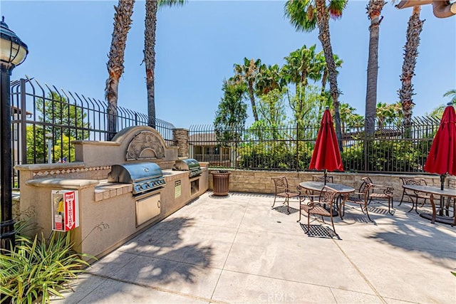 18956 Northern Dancer Ln, Yorba Linda, CA 92886 - view of patio featuring exterior kitchen and outdoor dining space