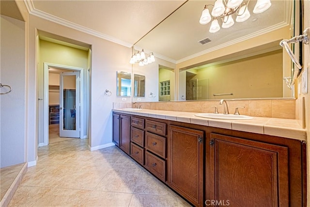 18956 Northern Dancer Ln, Yorba Linda, CA 92886 - bathroom with crown molding, double vanity, a chandelier, and tile patterned flooring