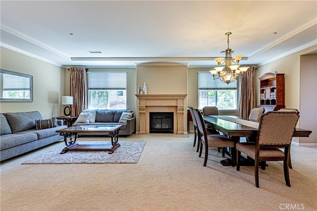 18956 Northern Dancer Ln, Yorba Linda, CA 92886 - dining space featuring a chandelier, plenty of natural light, light colored carpet, a tray ceiling, and crown molding
