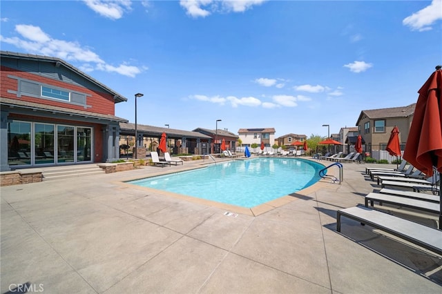 40497 Melrose Dr, Temecula, CA 92591 - community pool with a patio and a residential view