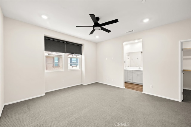 40497 Melrose Dr, Temecula, CA 92591 - unfurnished bedroom with carpet floors, a walk in closet, recessed lighting, ensuite bath, and ceiling fan