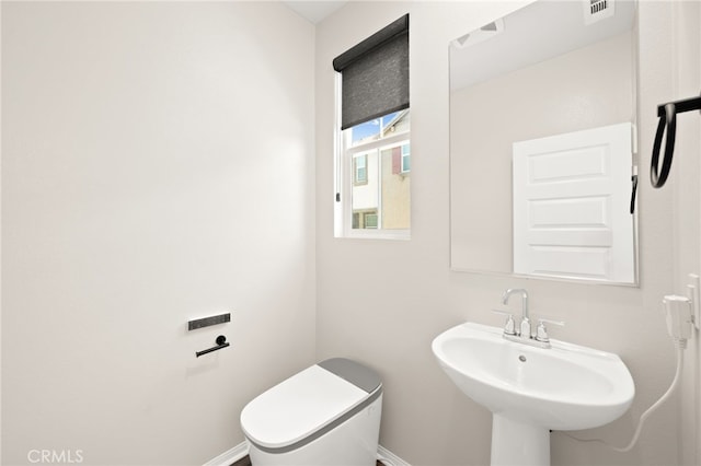 40497 Melrose Dr, Temecula, CA 92591 - half bathroom featuring a sink and toilet