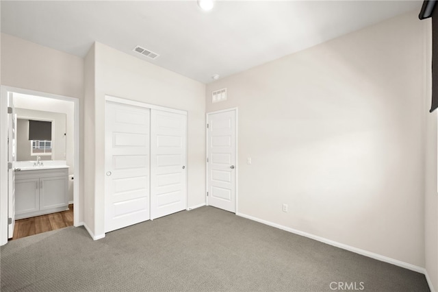 40497 Melrose Dr, Temecula, CA 92591 - unfurnished bedroom featuring carpet floors, a closet, and ensuite bath