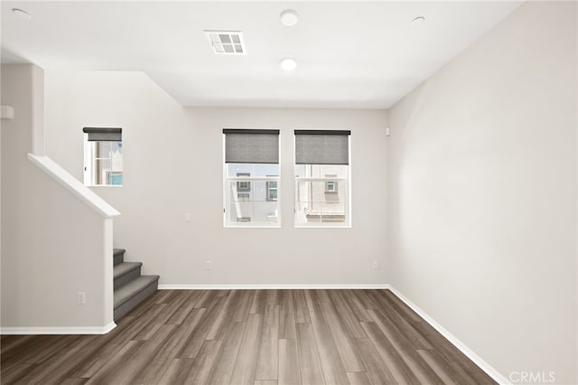 40497 Melrose Dr, Temecula, CA 92591 - spare room with wood finished floors and stairway