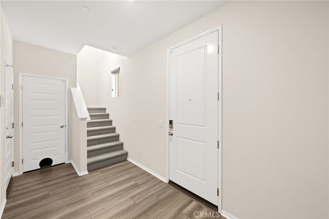 40497 Melrose Dr, Temecula, CA 92591 - entryway featuring light wood finished floors and stairs