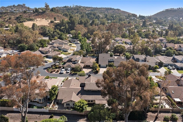 7543 E Twinleaf Trl, Orange, CA 92869 - aerial view of property and surrounding area featuring nearby suburban area and a mountain backdrop