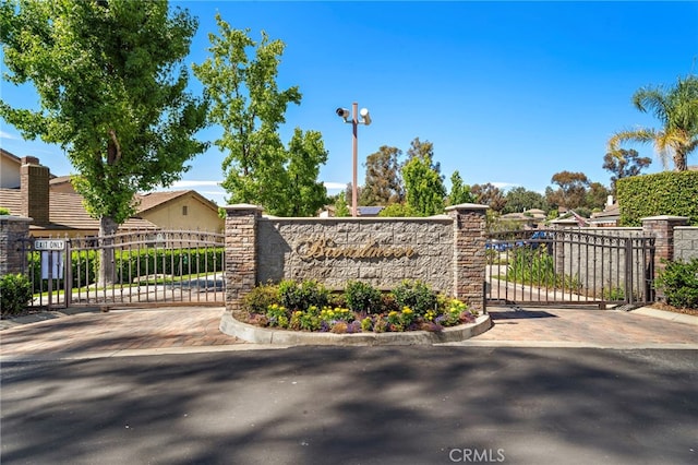 7543 E Twinleaf Trl, Orange, CA 92869 - community / neighborhood sign featuring a gate