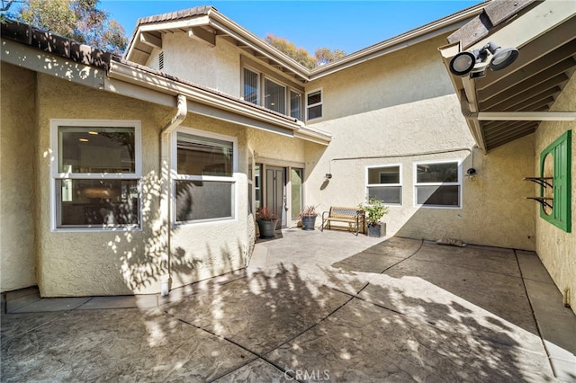 7543 E Twinleaf Trl, Orange, CA 92869 - back of house featuring a patio area and stucco siding