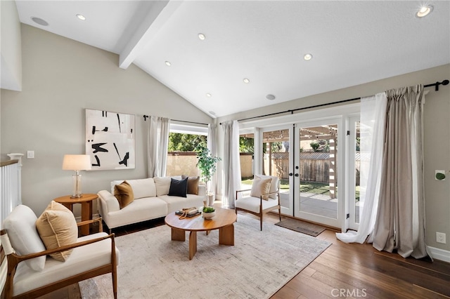 7543 E Twinleaf Trl, Orange, CA 92869 - living room featuring beam ceiling, french doors, wood-type flooring, high vaulted ceiling, and recessed lighting