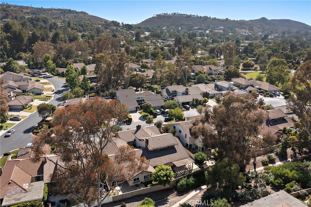 7543 E Twinleaf Trl, Orange, CA 92869 - aerial view of property's location featuring mountains and nearby suburban area