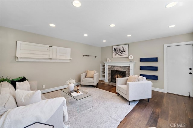 7543 E Twinleaf Trl, Orange, CA 92869 - living room with recessed lighting, a fireplace, and dark wood-style flooring