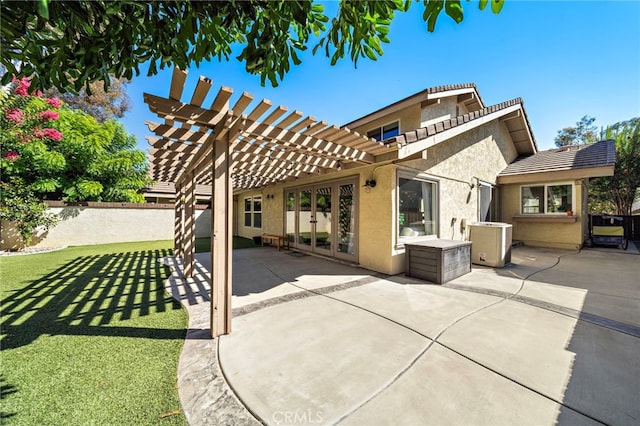 7543 E Twinleaf Trl, Orange, CA 92869 - rear view of property with a pergola, stucco siding, a patio area, french doors, and a tile roof