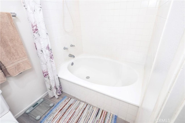 12356 Thistle Dr, Rancho Cucamonga, CA 91739 - full bathroom featuring baseboards and shower / tub combo
