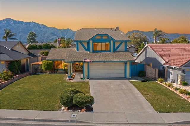 12356 Thistle Dr, Rancho Cucamonga, CA 91739 - view of front of house with a mountain view, an attached garage, driveway, and stucco siding