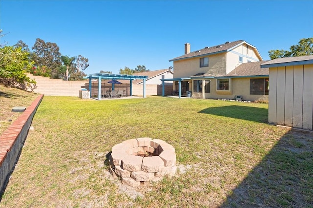 12356 Thistle Dr, Rancho Cucamonga, CA 91739 - fenced backyard with an outdoor fire pit, a pergola, and a patio