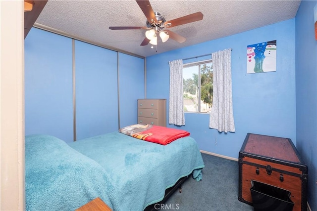 12356 Thistle Dr, Rancho Cucamonga, CA 91739 - carpeted bedroom with a textured ceiling and a ceiling fan