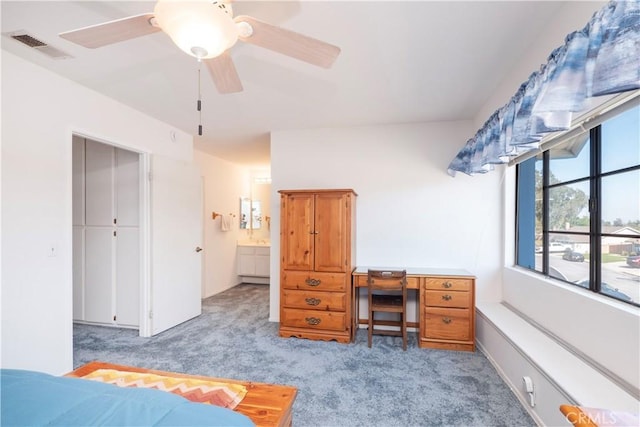 12356 Thistle Dr, Rancho Cucamonga, CA 91739 - bedroom with light colored carpet, ensuite bath, and a ceiling fan