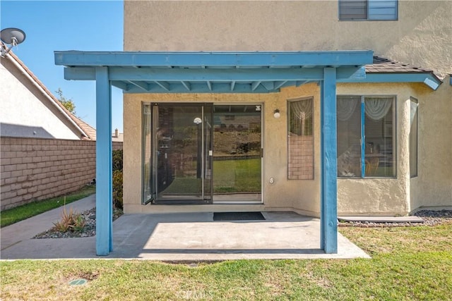 12356 Thistle Dr, Rancho Cucamonga, CA 91739 - doorway to property featuring stucco siding and a patio