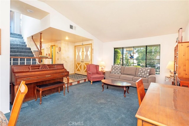 12356 Thistle Dr, Rancho Cucamonga, CA 91739 - living area with carpet flooring, stairs, and lofted ceiling