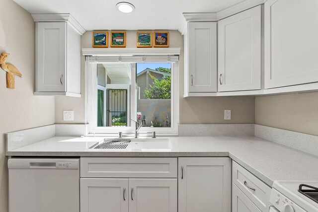 8815 Yuba Cir Unit 1102B, Huntington Beach, CA 92646 - kitchen featuring white dishwasher, white cabinetry, light countertops, and stove