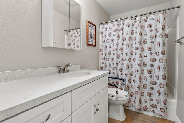 8815 Yuba Cir Unit 1102B, Huntington Beach, CA 92646 - bathroom with vanity, wood finished floors, and shower / bath combo