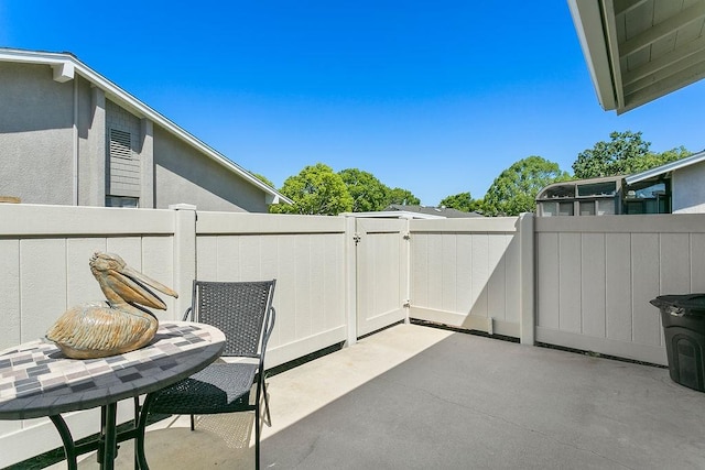 8815 Yuba Cir Unit 1102B, Huntington Beach, CA 92646 - view of patio featuring a gate