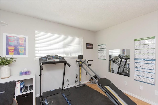 3360 Vanderbilt Ave, Turlock, CA 95382 - exercise area featuring baseboards and a textured ceiling