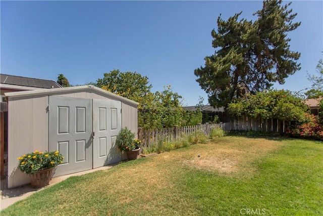 3360 Vanderbilt Ave, Turlock, CA 95382 - fenced backyard featuring a storage unit