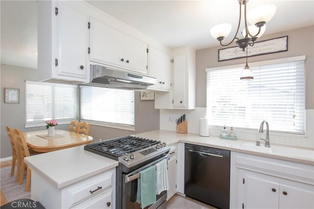 3360 Vanderbilt Ave, Turlock, CA 95382 - kitchen with black dishwasher, stainless steel gas range oven, under cabinet range hood, white cabinetry, and light countertops