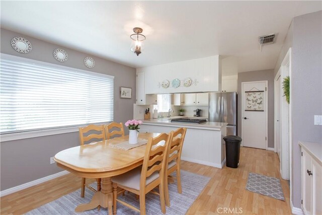 3360 Vanderbilt Ave, Turlock, CA 95382 - dining room with light wood-type flooring