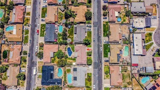 3360 Vanderbilt Ave, Turlock, CA 95382 - aerial view of property's location featuring a pool area and nearby suburban area