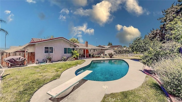 3360 Vanderbilt Ave, Turlock, CA 95382 - view of swimming pool with a diving board and a patio area