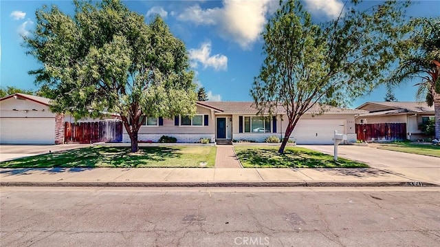 3360 Vanderbilt Ave, Turlock, CA 95382 - ranch-style home with concrete driveway and an attached garage