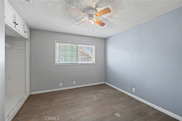 1906 Cloverdale Dr, Pomona, CA 91767 - unfurnished bedroom with wood finished floors, a textured ceiling, a closet, and ceiling fan