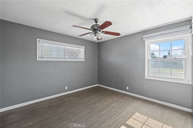 1906 Cloverdale Dr, Pomona, CA 91767 - unfurnished room featuring plenty of natural light, wood finished floors, a ceiling fan, and a textured ceiling