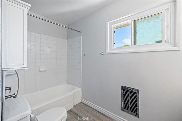 1906 Cloverdale Dr, Pomona, CA 91767 - full bathroom with wood finished floors and shower / washtub combination
